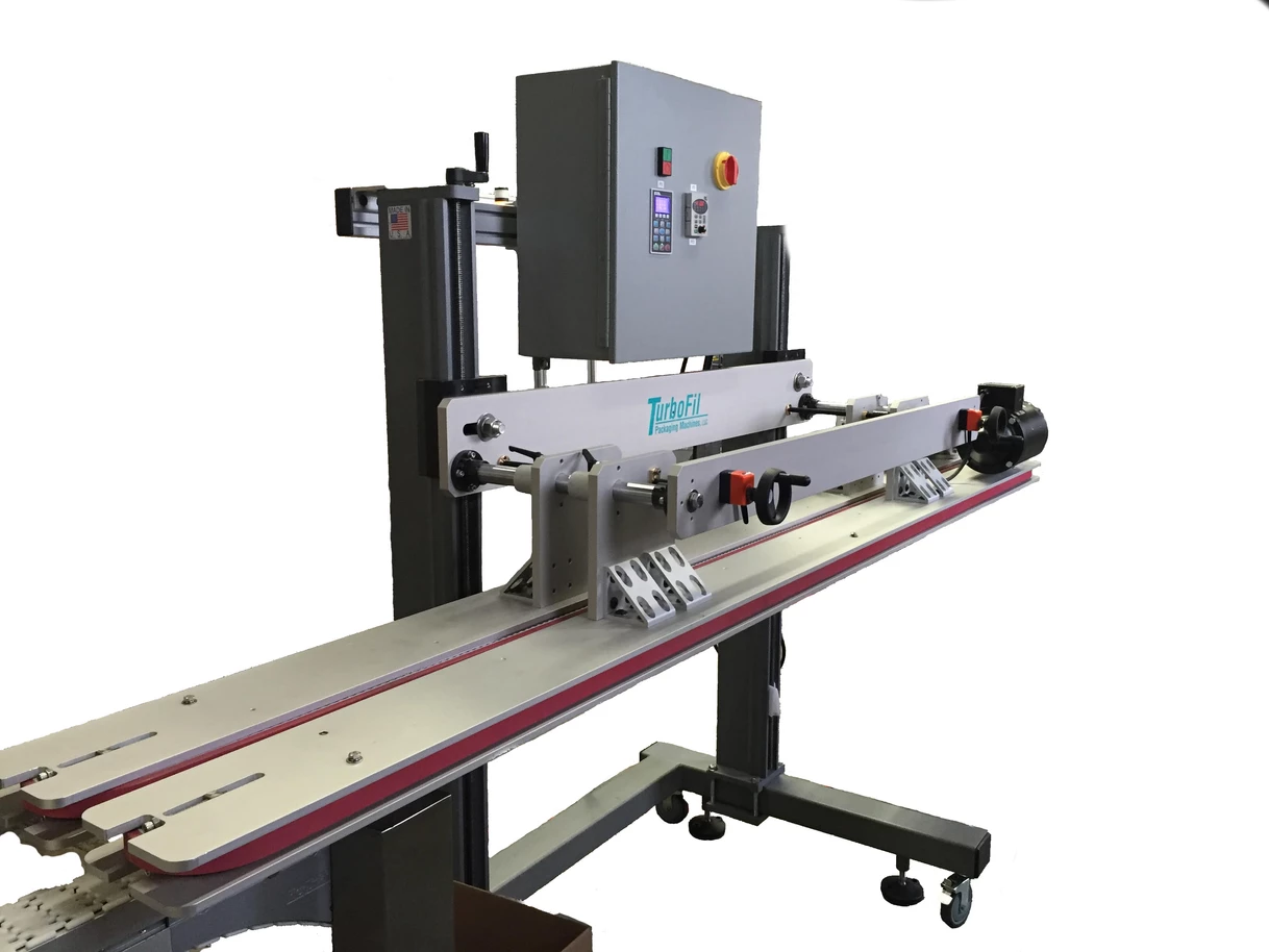 Inline depucking machine used to remove vial pucks